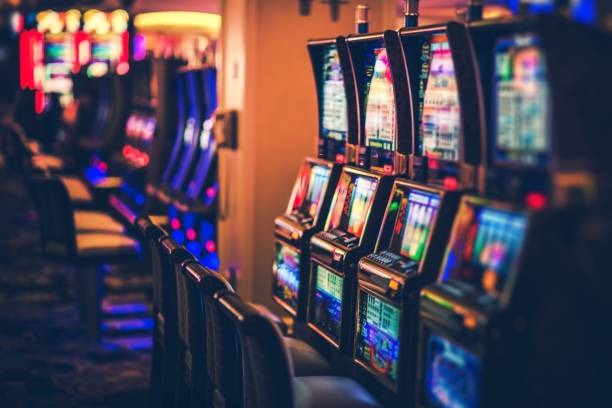 ulti700 platform showing live casino tables and football betting interface on mobile screen